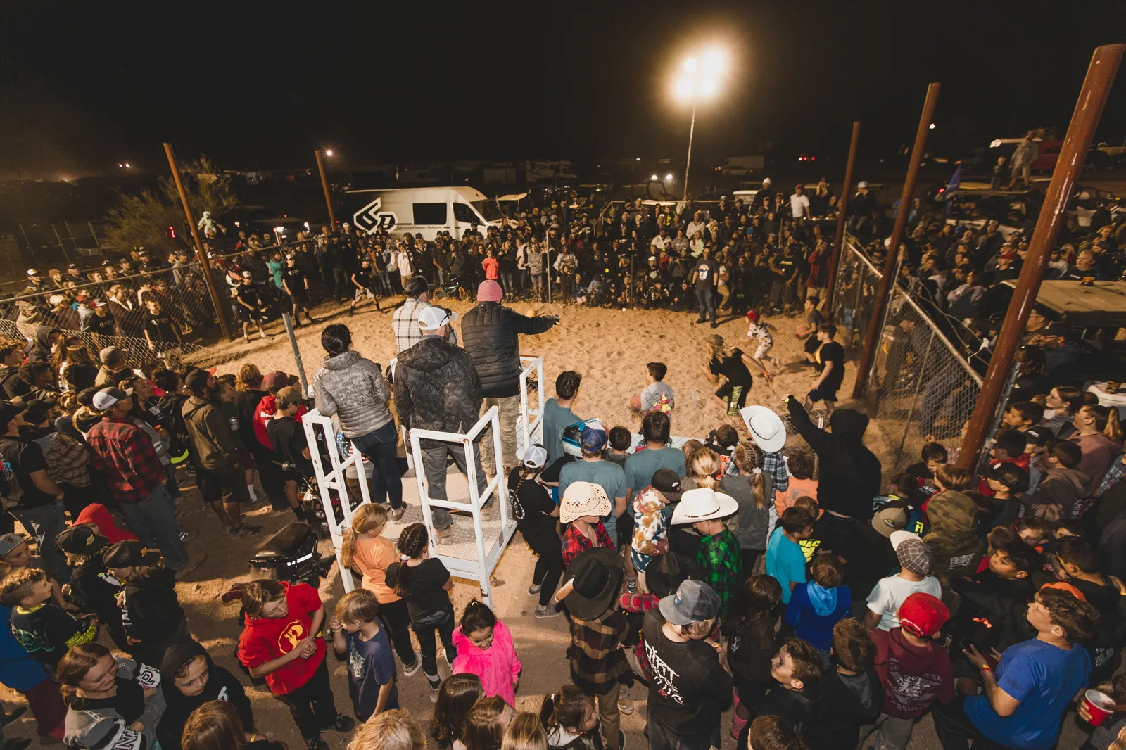 Crowd gathered at an AZ Open nighttime event
